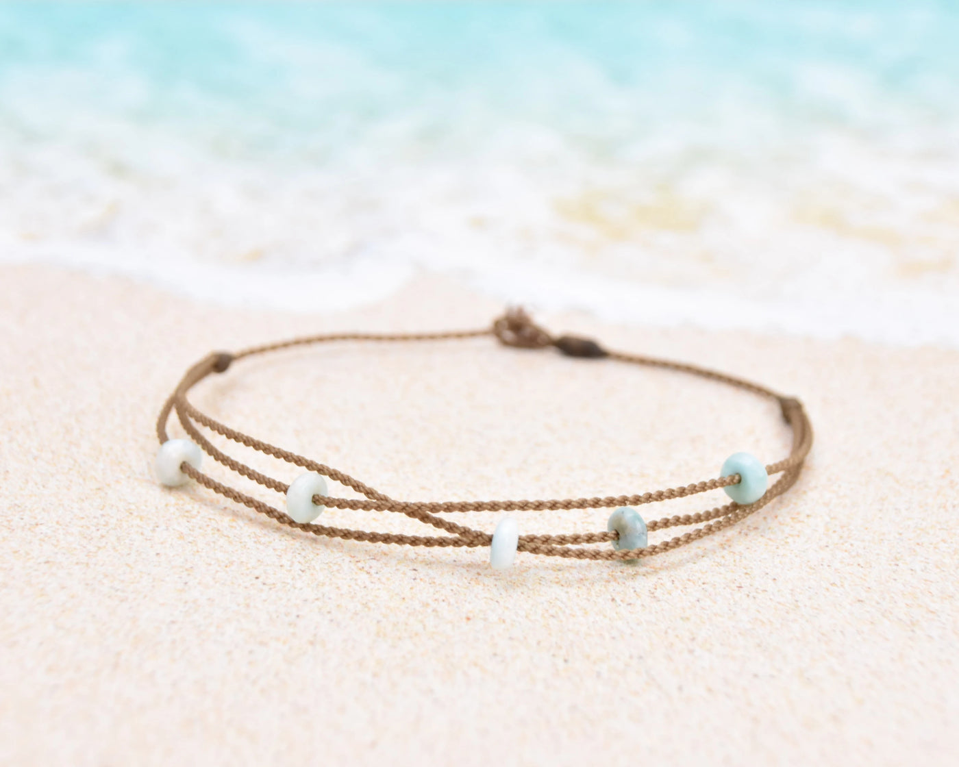 Tula Blue's waterproof Riptide anklet in larimar stones. All the drama of a stack in one perfect anklet.
