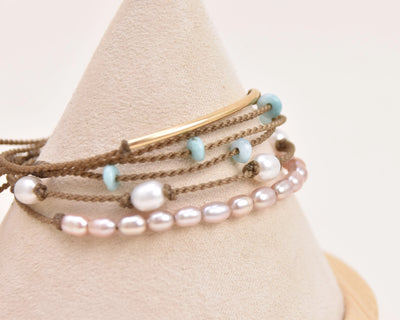 sunlit lagoon bracelet stack on cone bust with white background