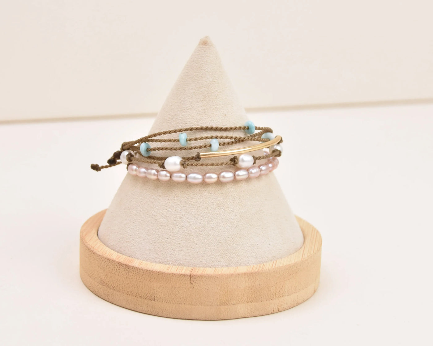 sunlit lagoon bracelet stack on bust cone with white background