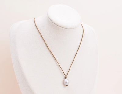 Pearl Drop Necklace in Silver on a white bust