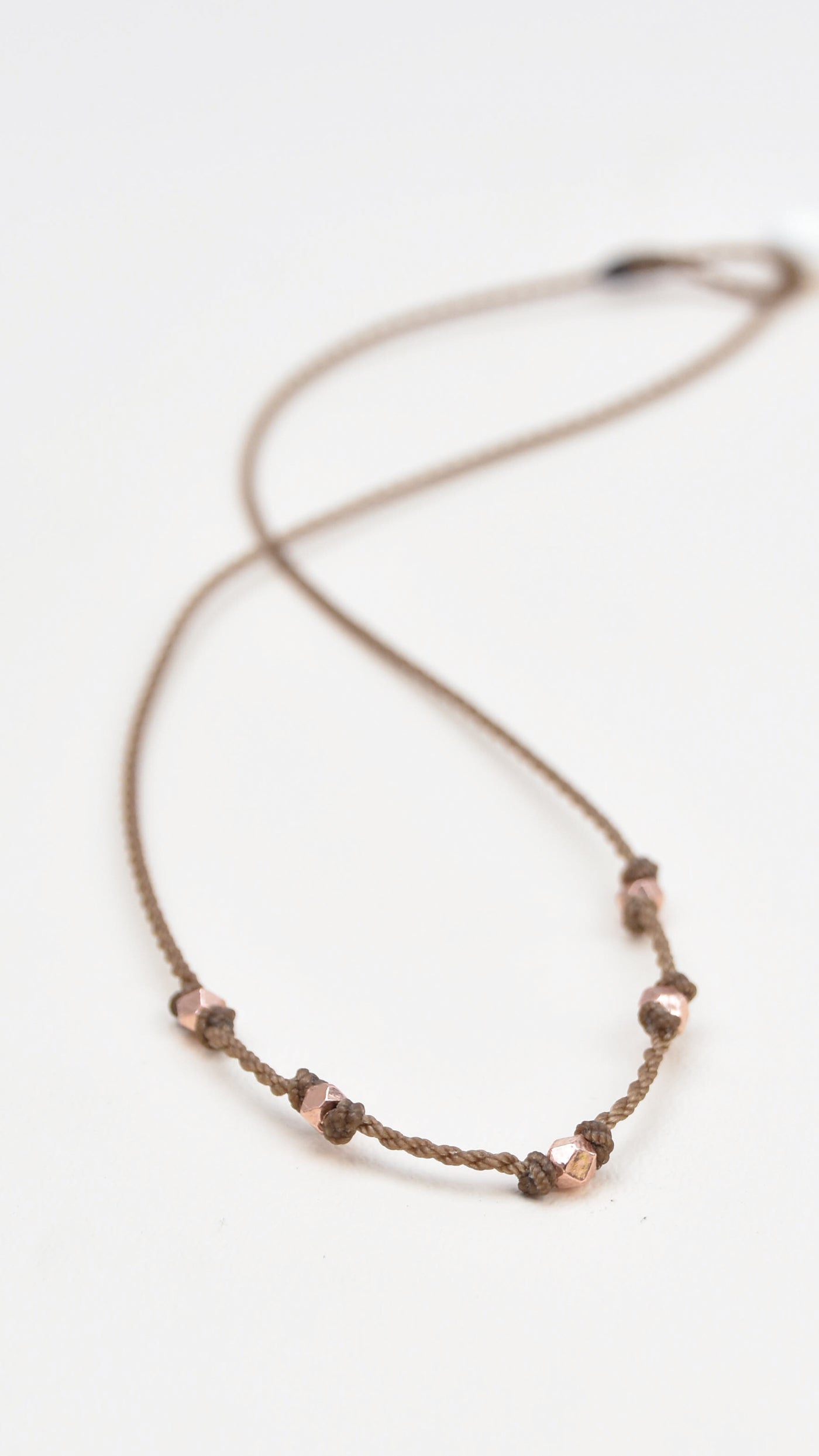 Quinn-1920-Rose Gold Faceted Tiny
