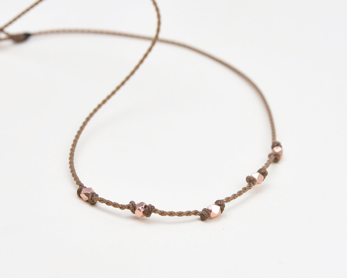 Quinn-1920-Rose Gold Faceted Tiny